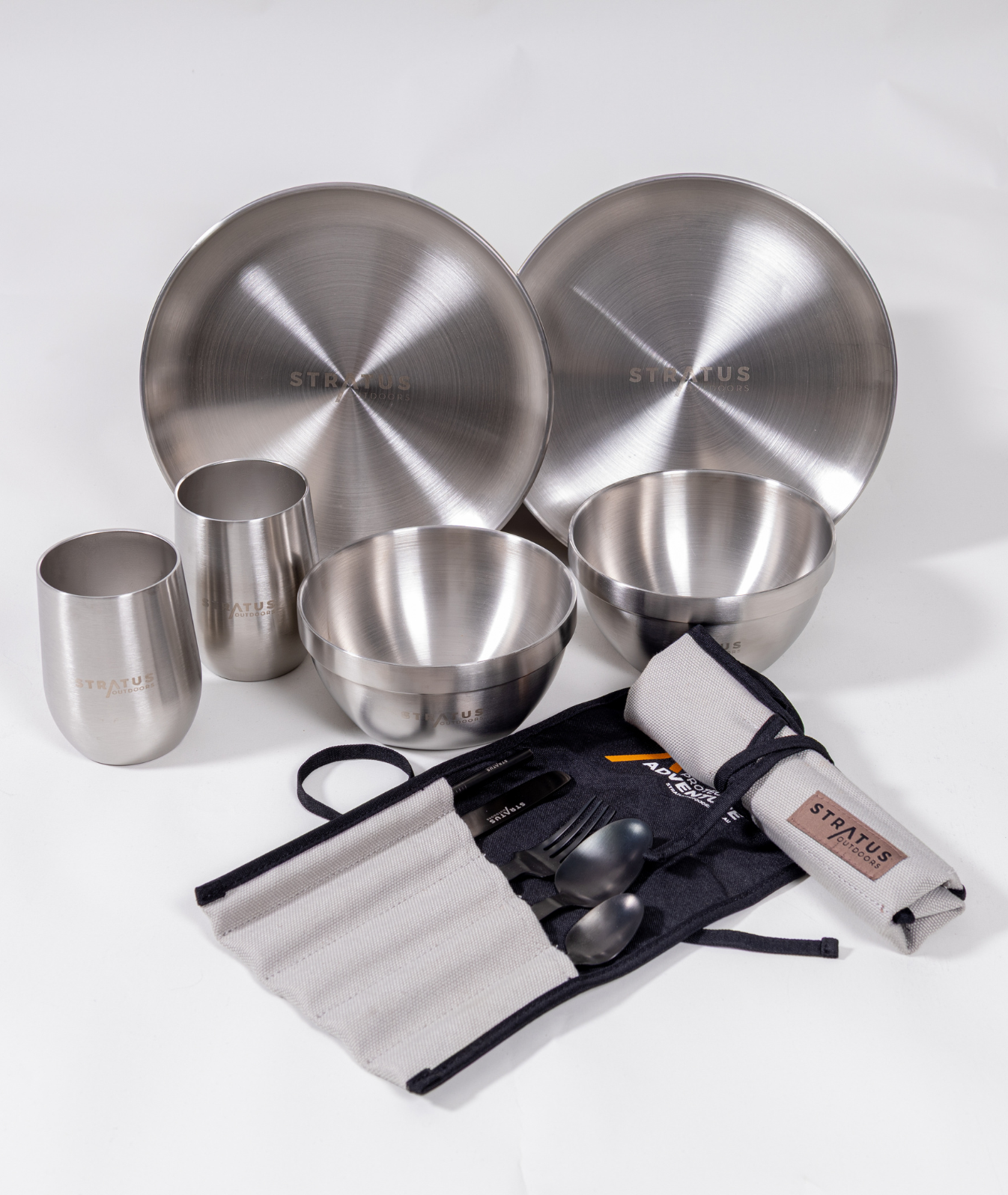 Dinnerware Twin Set in brushed 304‑grade stainless steel displayed on picnic table ready for outdoor meal.