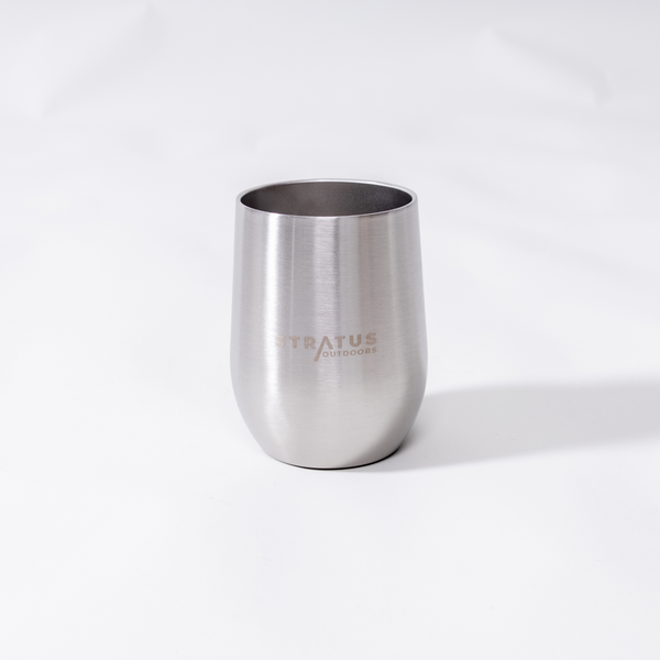 Side view of the Dinnerware double‑walled bowls (950 ml) and cups (400 ml) neatly arranged on camp table.”