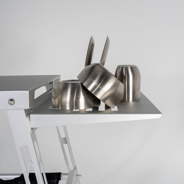 Stratus Outdoors Sink Rack attached to camp table, used for drying plates and cooking utensils.