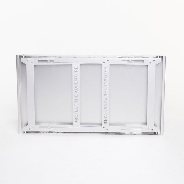 DEREK Camp Table in folded demonstrating portability and compact storage